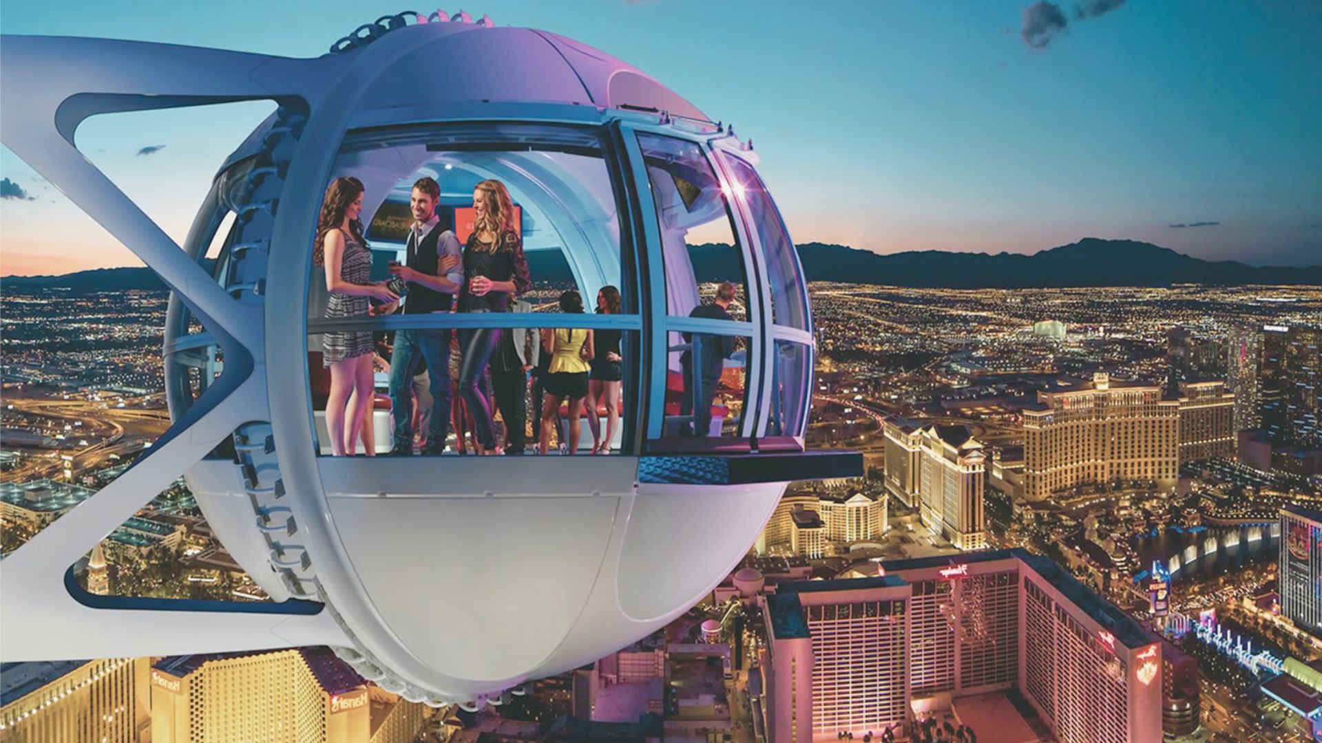 The Las Vegas Sky Ride, the world's tallest observation wheel, towers against a clear blue sky.