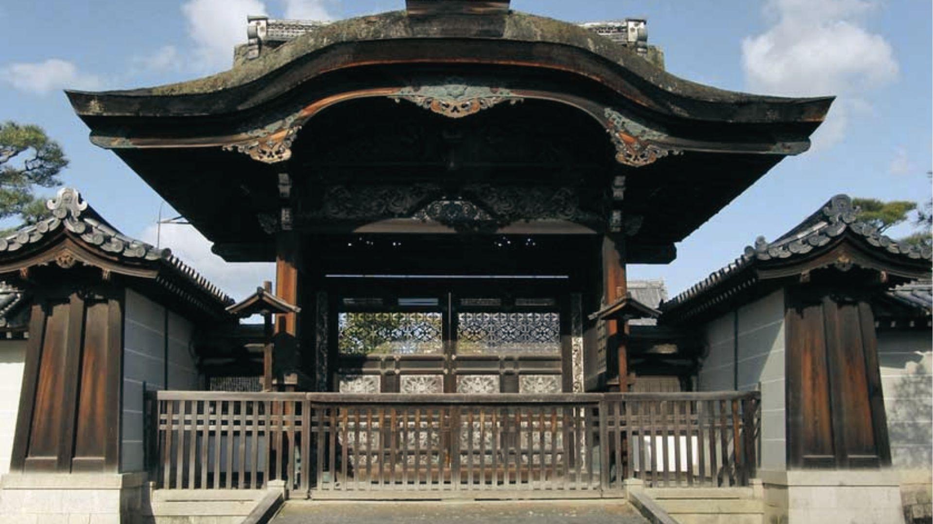 Enter Daikaku-ji Temple's carved wooden gate, experience imperial history and Kyoto's serene grounds.