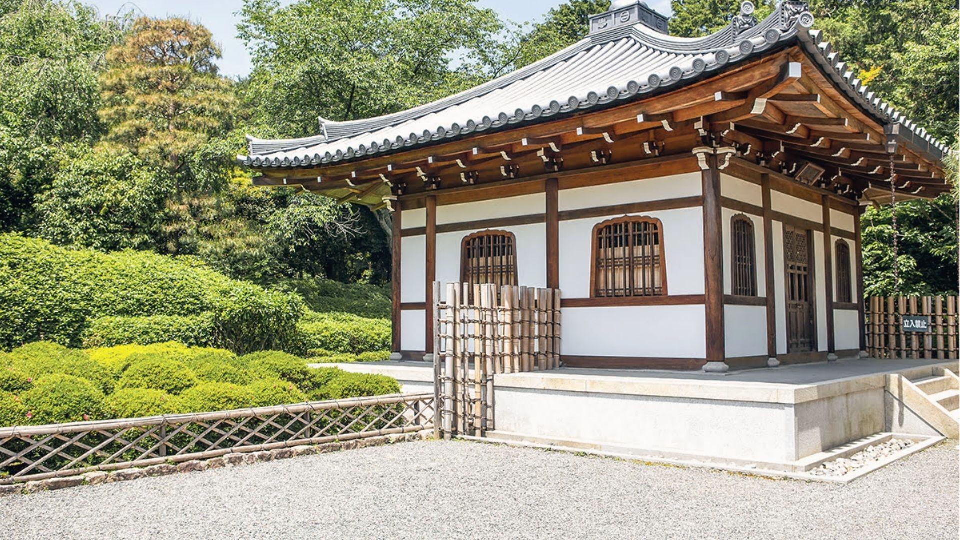 Find peace at a serene Kyoto temple hall surrounded by lush gardens, perfect for mindful walks.