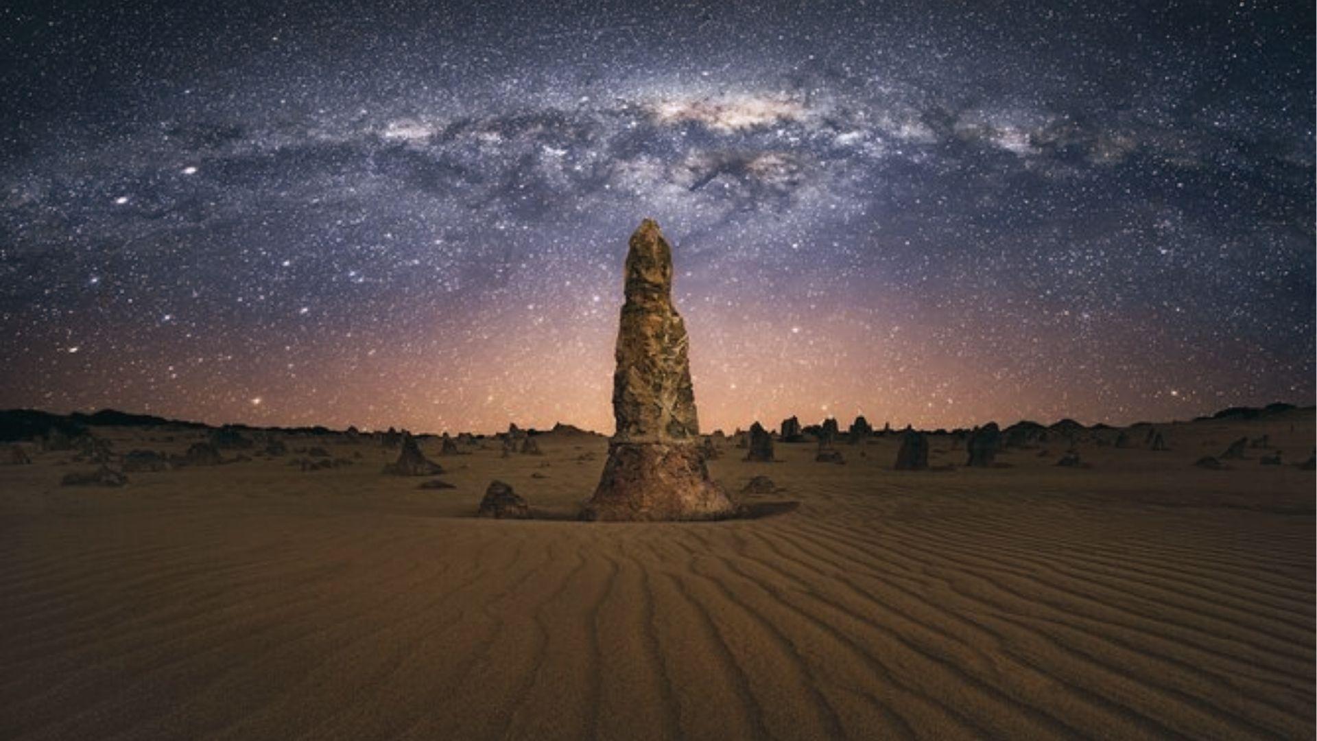 Stargaze at The Pinnacles Desert limestone spires, capture star trails on night photography tours.