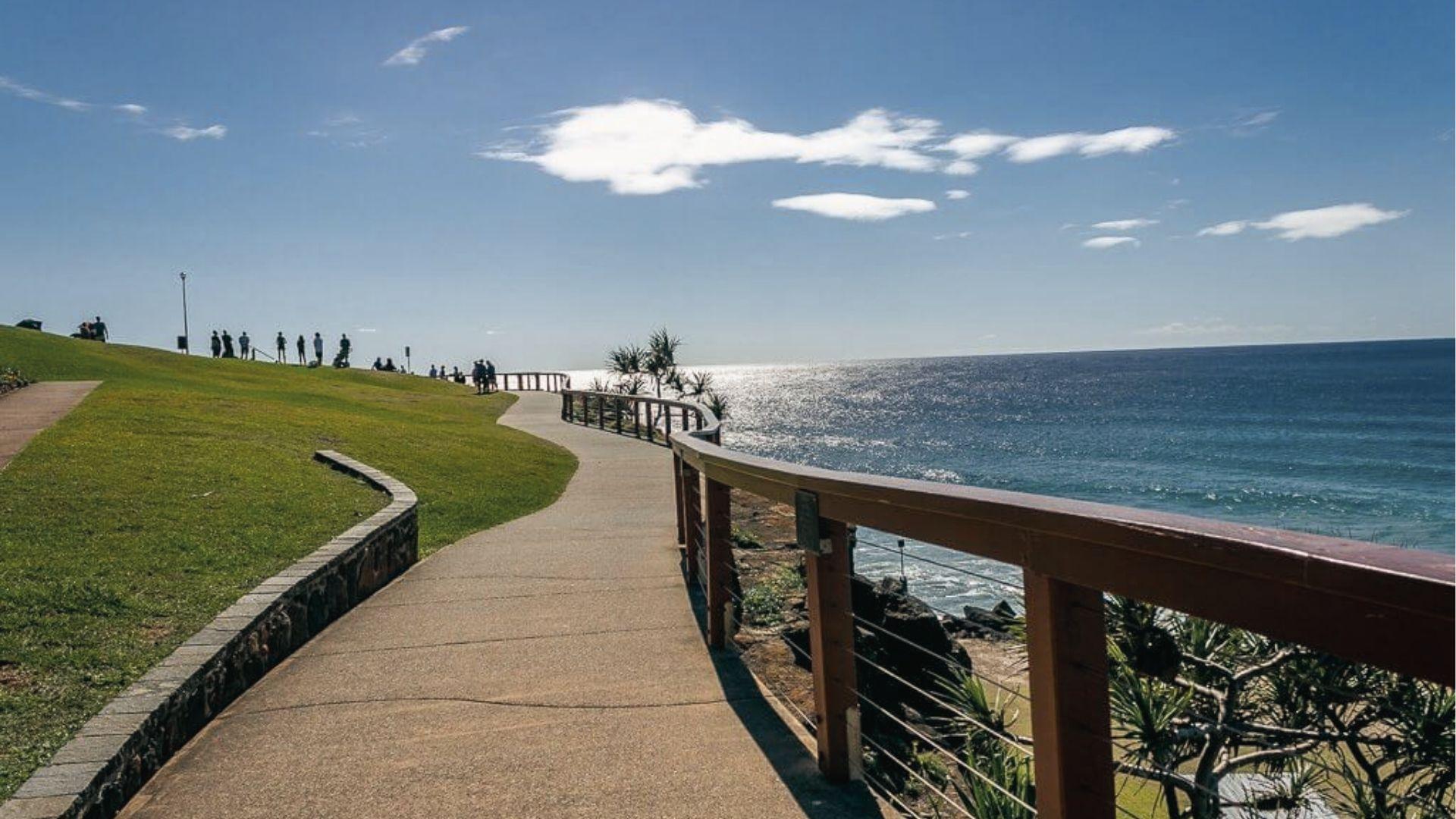 Stroll the winding coastal path above turquoise waves, a scenic ocean walk and lookout point.