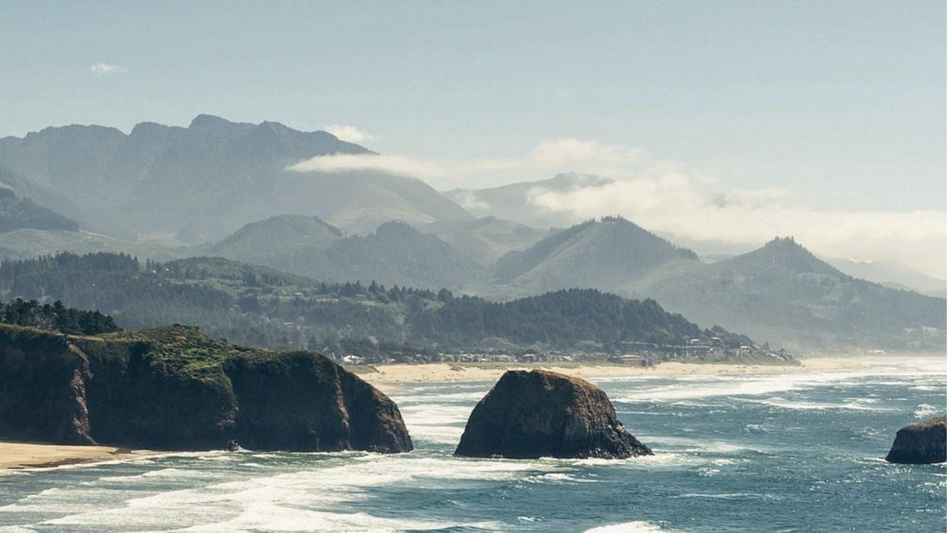 Canon beach in Oregon is best to visit in spring.