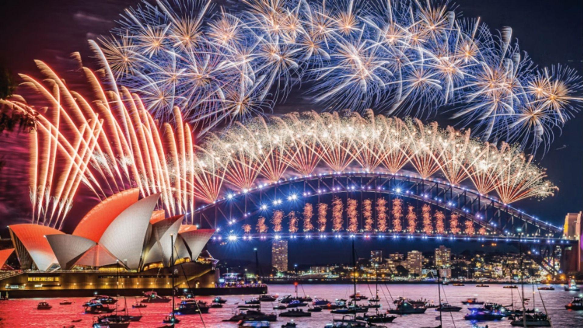 Watch fireworks light up the Opera House and Harbour. Celebrate New Year in Sydney, Australia